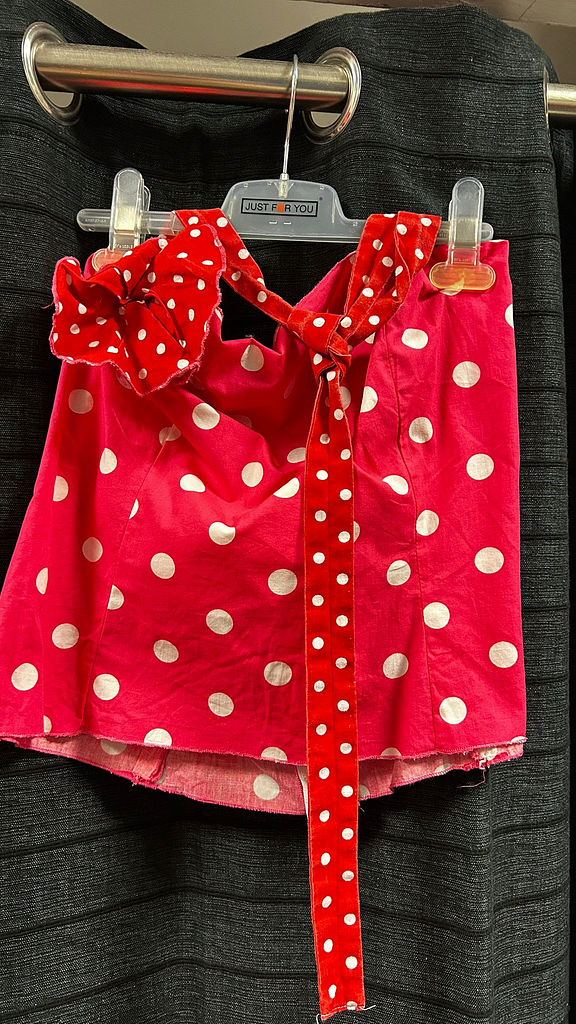Roze polka dot top met strik