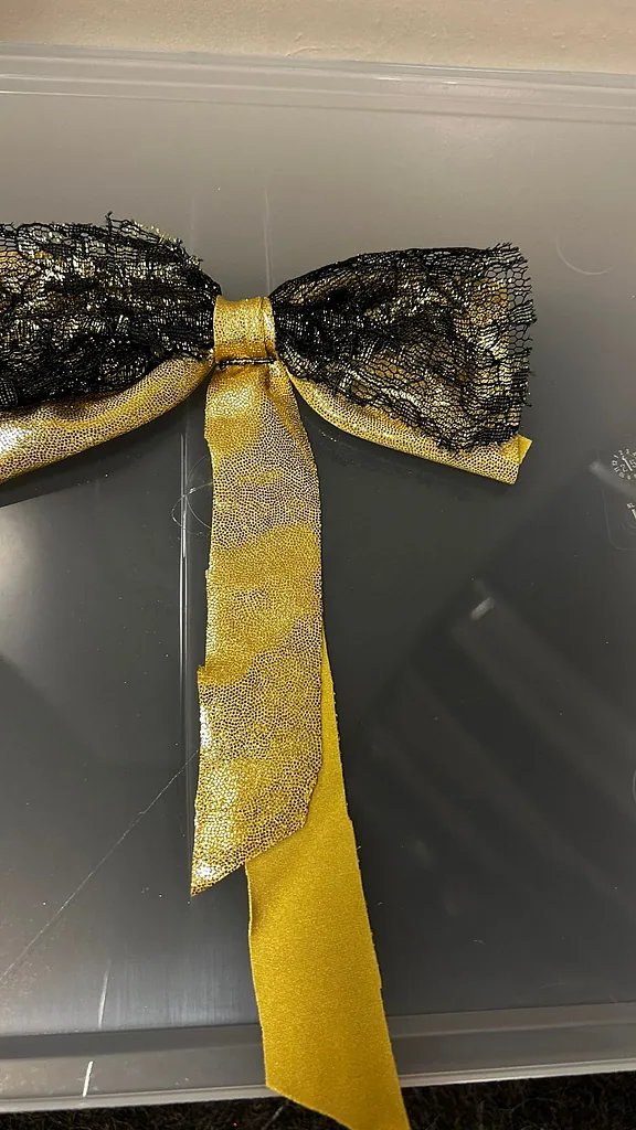Haar strik goud zwart