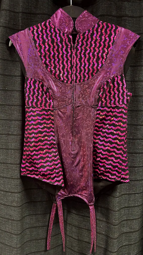 Mouwloos glitter vestje