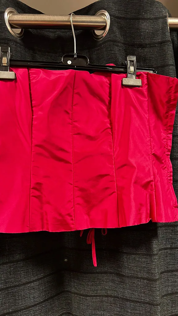 Roze korset, foto 1 van 2