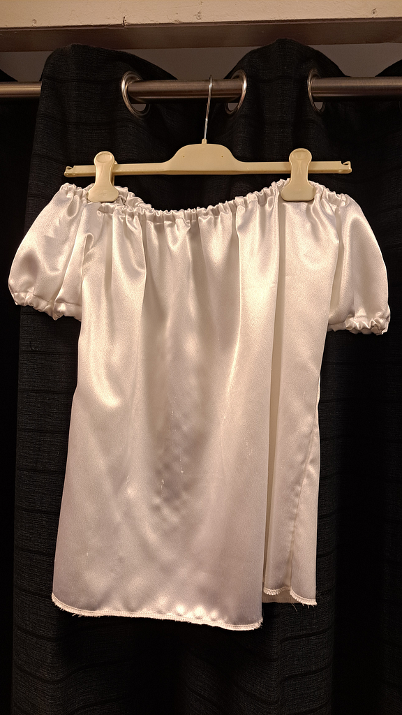 Witte glimmende blouse