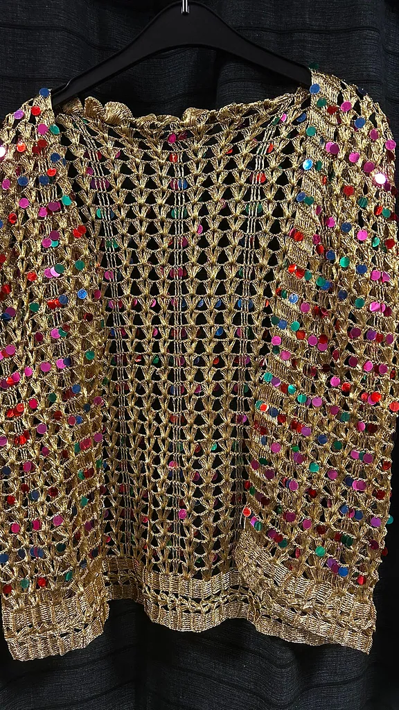 Goud en kleuren vest