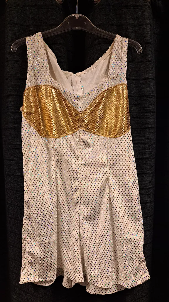Witte pailletten top met gouden buste